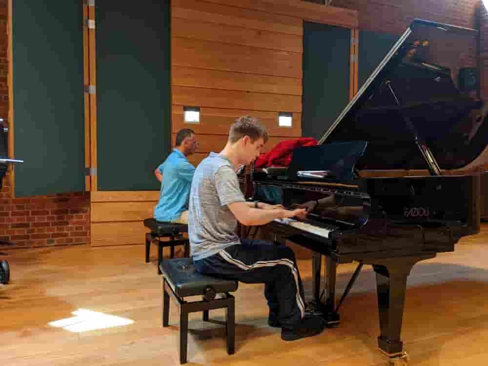 Ethan, 2022 with Fali playing on two pianos