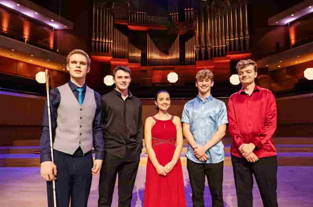 Ethan, BBC Young Musician 2022 - Final, standing with all the competitors smiling