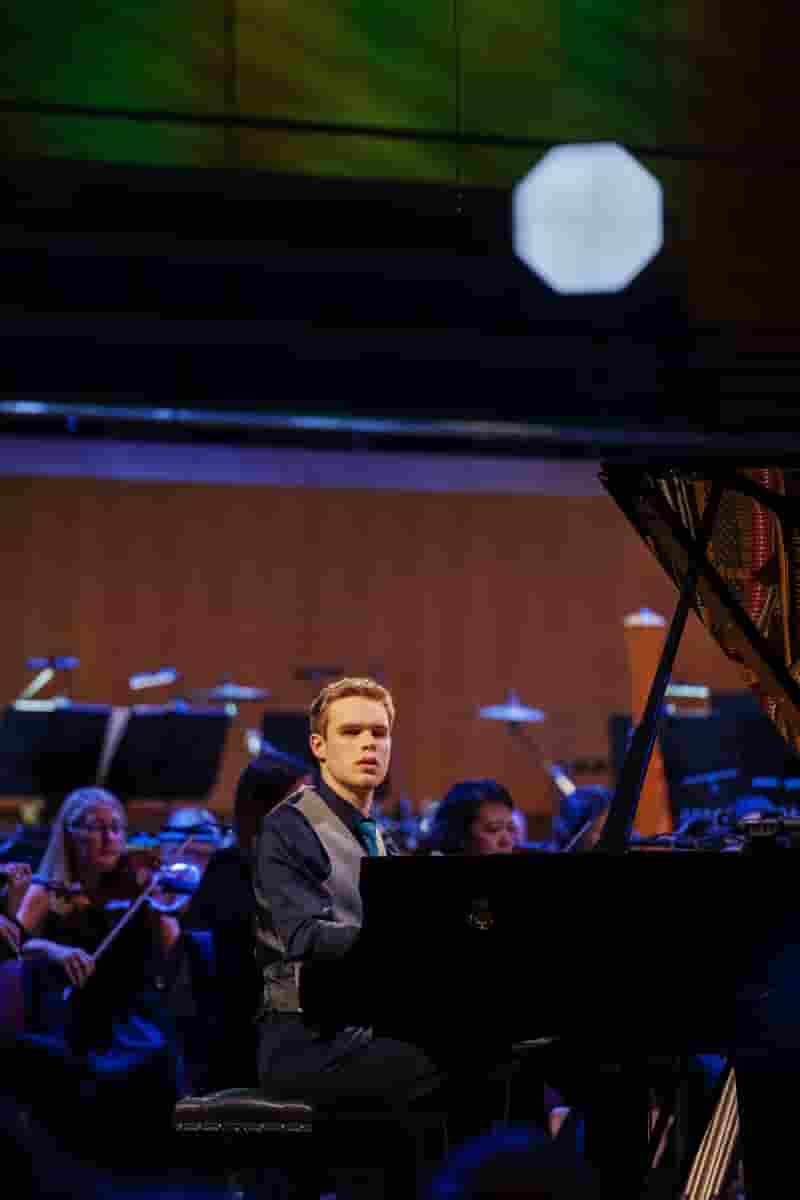 Ethan, BBC Young Musician 2022 - Final, playing piano, in front of orchestra